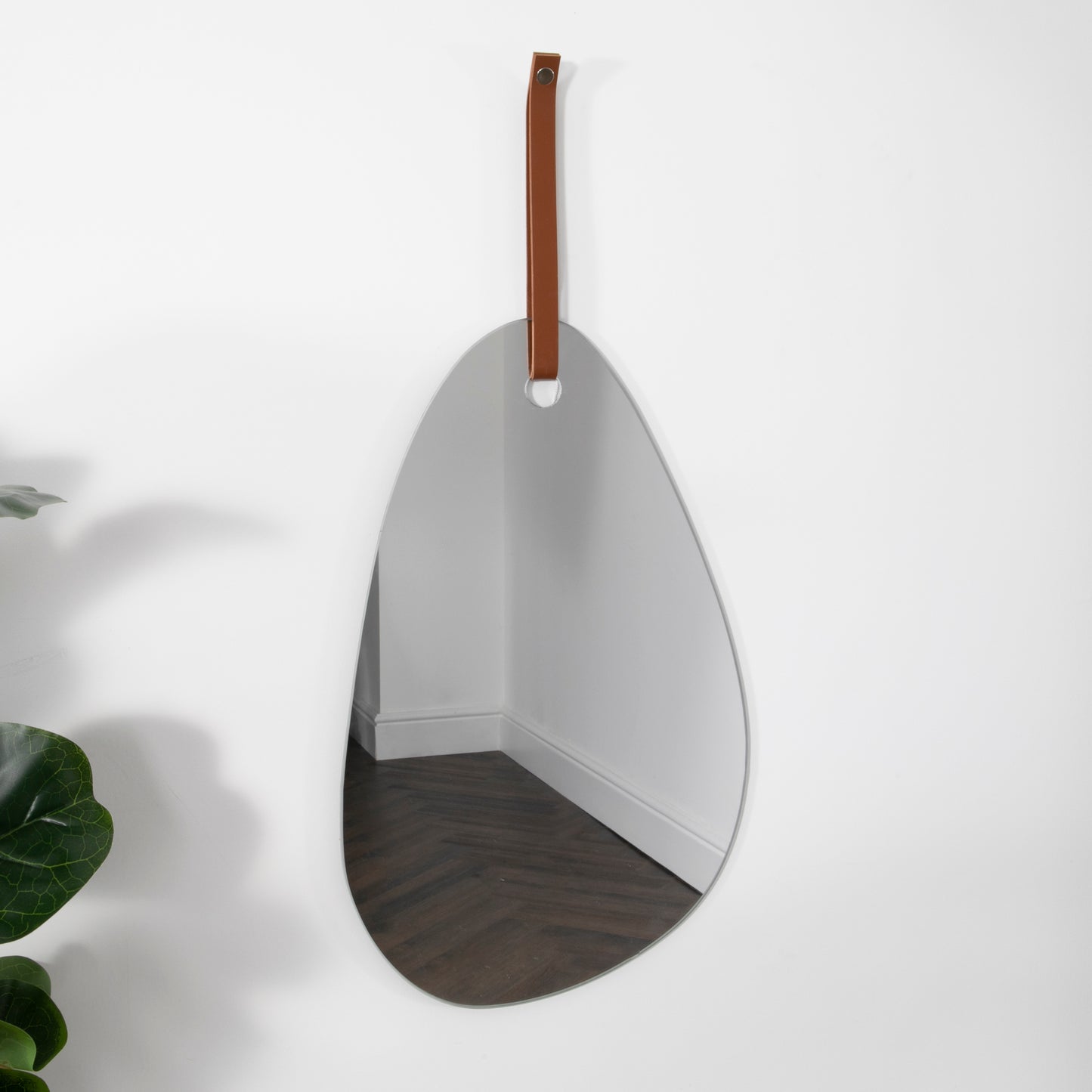 Pebble Shaped Mirror with Brown Leather Hanging Strap 50 x 26cm CasaFenix