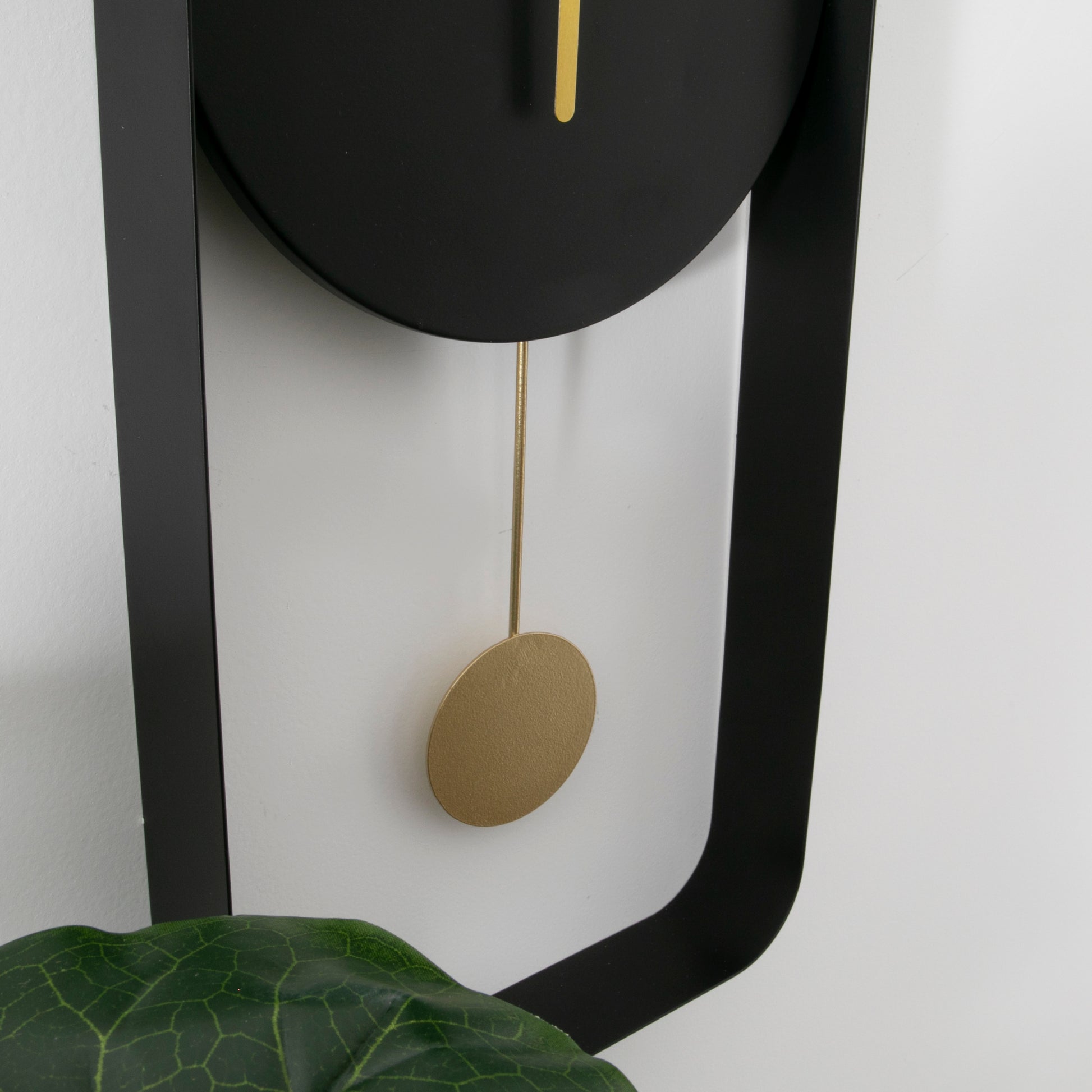 Matte Black Metal Pendulum Wall Clock with Gold Details  CasaFenix