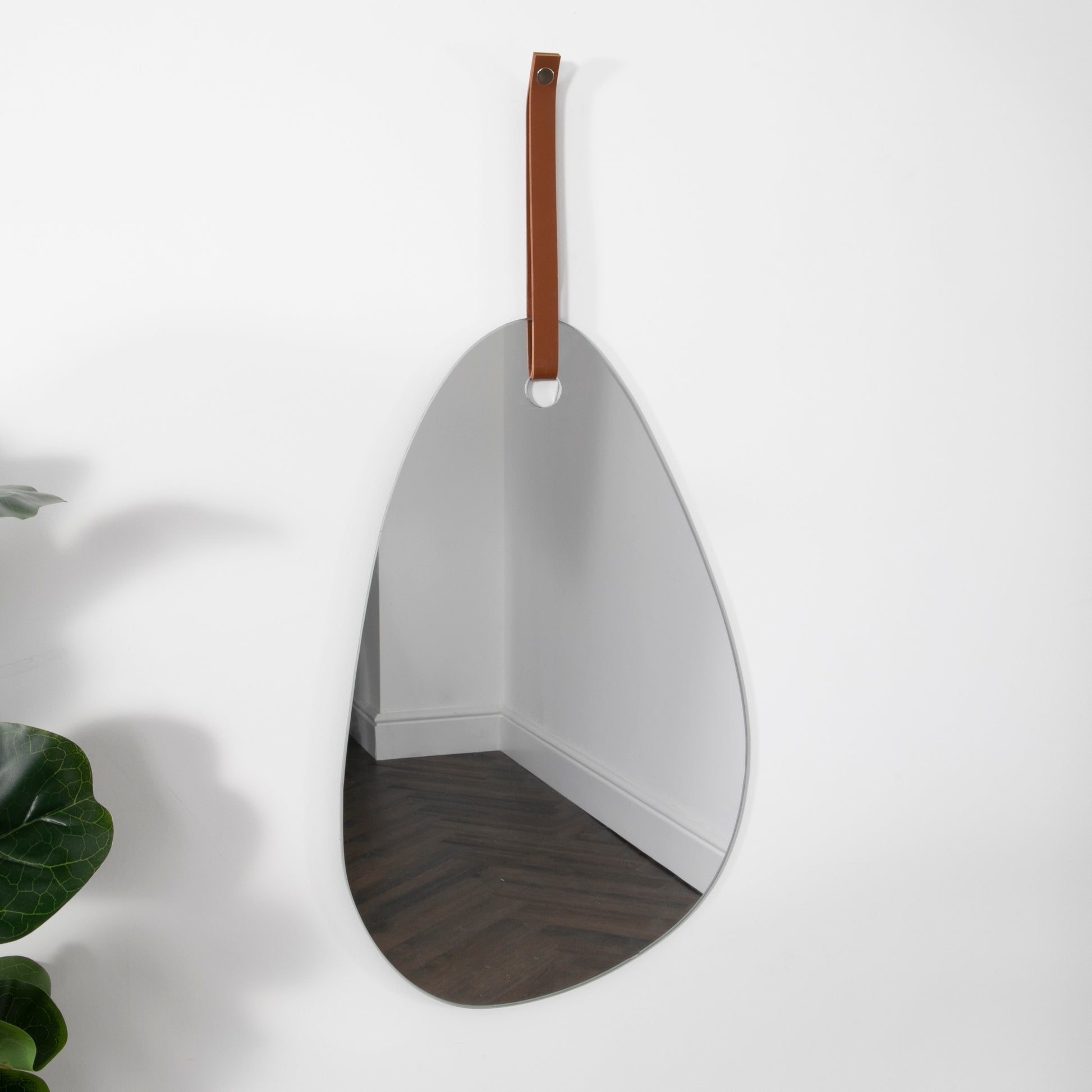 Pebble Shaped Mirror with Brown Leather Hanging Strap 50 x 26cm  CasaFenix